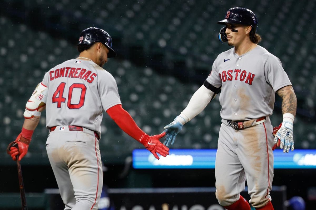 May 4, 2026; Detroit, Michigan, USA;  Boston Red Sox left fielder Jarren Duran (16) receives congratulations from first baseman Willson Contreras (40)  after he hits a three run home run in the seventh inning against the Detroit Tigers at Comerica Park. Mandatory Credit: Rick Osentoski-Imagn Images