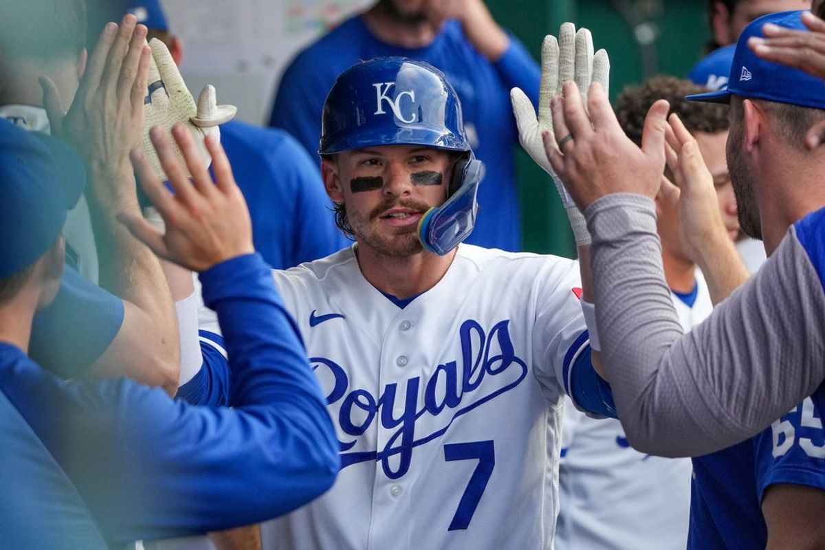 May 4, 2026; Kansas City, Missouri, USA; Kansas City Royals shortstop Bobby Witt Jr. (7) celebrates in the dugout after hitting a solo home run against the Cleveland Guardians during the fourth inning at Kauffman Stadium. Mandatory Credit: Denny Medley-Imagn Images