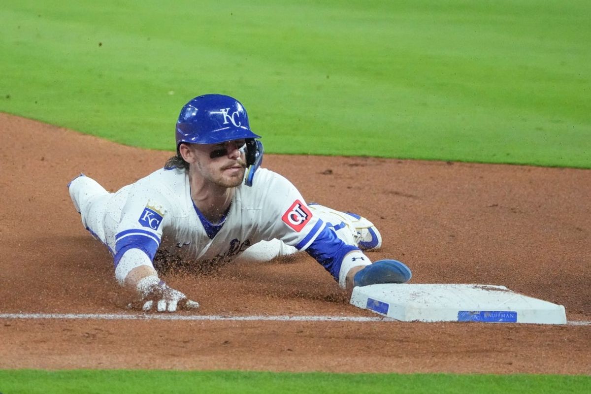 May 4, 2026; Kansas City, Missouri, USA; Kansas City Royals shortstop Bobby Witt Jr. (7) steals third base against the Cleveland Guardians during the seventh inning at Kauffman Stadium. Mandatory Credit: Denny Medley-Imagn Images