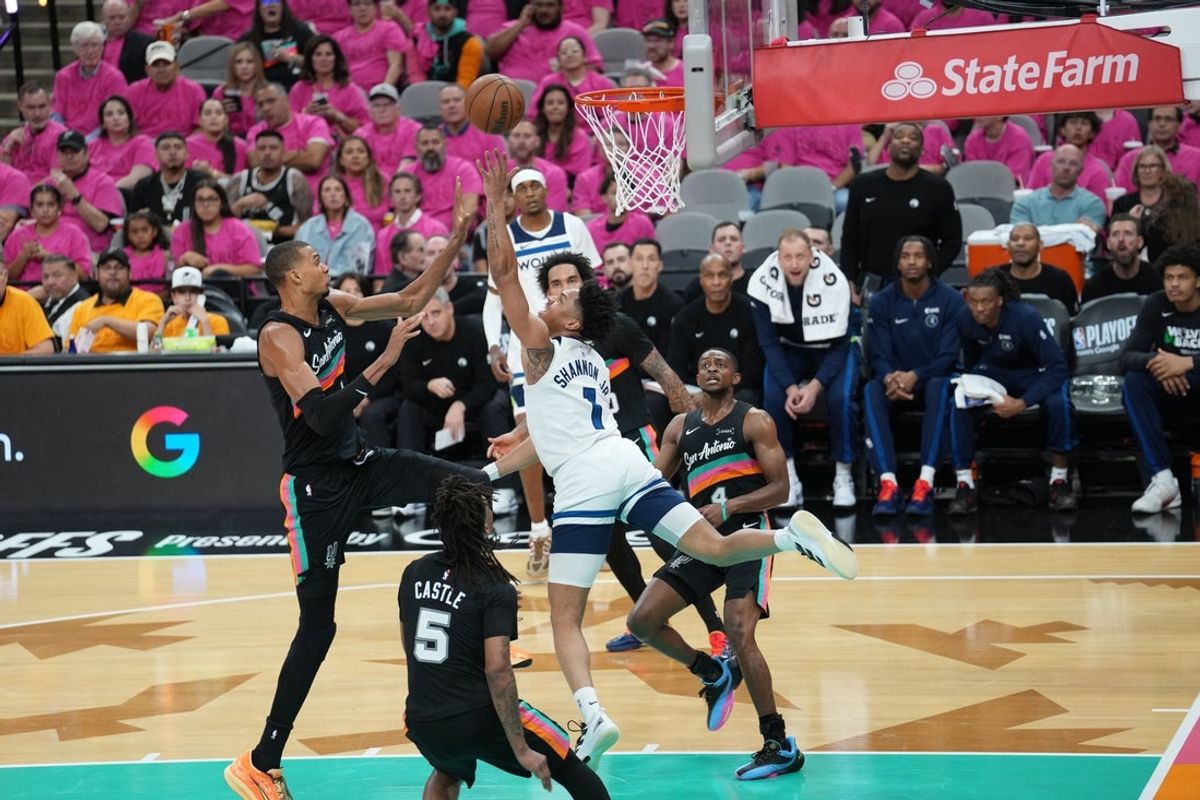 Minnesota Timberwolves guard Terrence Shannon Jr. (1) shoots in front of San Antonio Spurs forward Victor Wembanyama (1) in the second half during game one of the second round of the 2026 NBA Playoffs at Frost Bank Center. Mandatory Credit: Daniel Dunn-Imagn Images