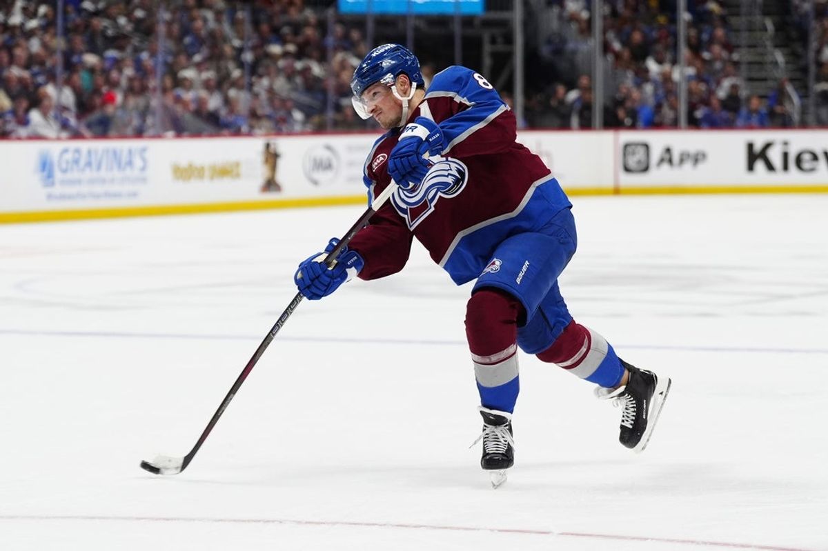 May 5, 2026; Denver, Colorado, USA; Colorado Avalanche defenseman Cale Makar (8) takes a shot on goal against the Minnesota Wild during the second period in game two of the second round of the 2026 Stanley Cup Playoffs at Ball Arena. Mandatory Credit: Ron Chenoy-Imagn Images