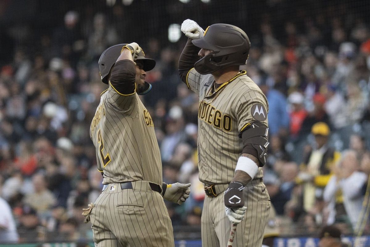 May 5, 2026; San Francisco, California, USA; San Diego Padres shortstop Xander Bogaerts (2) and right fielder Nick Castellanos (21) celebrate during the second inning against the San Francisco Giants at Oracle Park. Mandatory Credit: Stan Szeto-Imagn Images