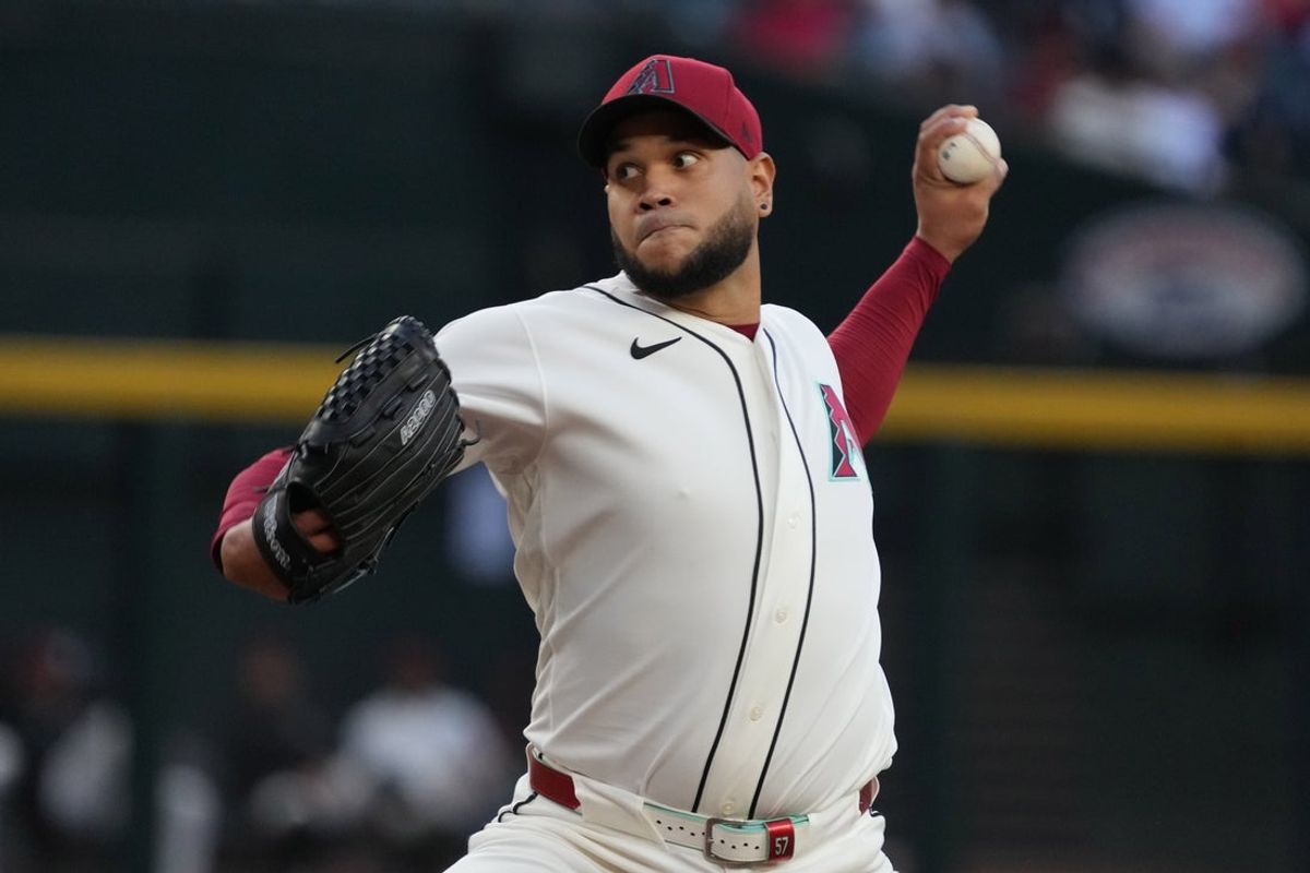 May 5, 2026; Phoenix, Arizona, USA; Arizona Diamondbacks pitcher Eduardo Rodriguez (57) throws against the Pittsburgh Pirates in the first inning at Chase Field. Mandatory Credit: Rick Scuteri-Imagn Images