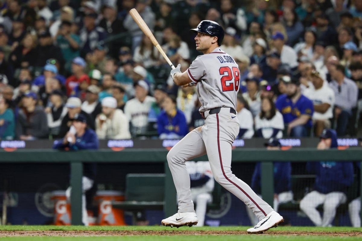 May 5, 2026; Seattle, Washington, USA; Atlanta Braves first baseman Matt Olson (28) hits a solo-home run against the Seattle Mariners during the ninth inning at T-Mobile Park. Mandatory Credit: Joe Nicholson-Imagn Images