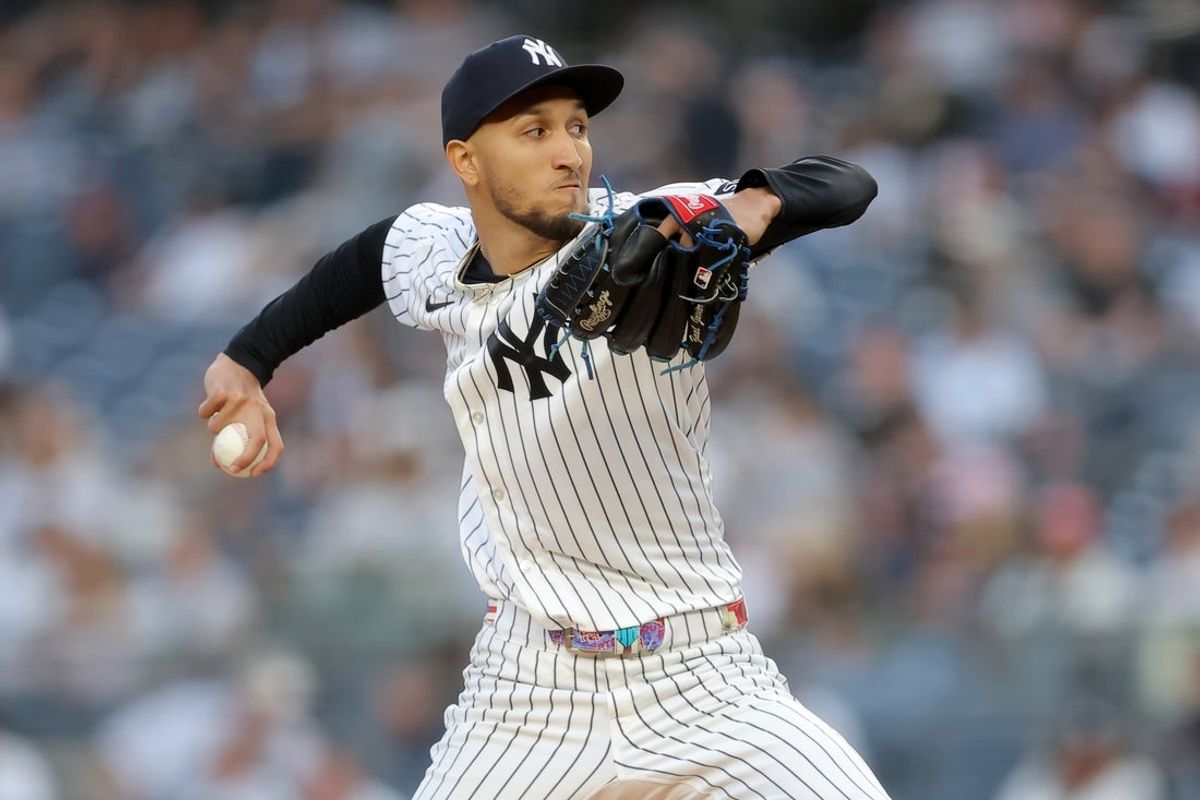 May 5, 2026; Bronx, New York, USA; New York Yankees starting pitcher Elmer Rodriguez (71) pitches against the Texas Rangers during the first inning at Yankee Stadium. Mandatory Credit: Brad Penner-Imagn Images