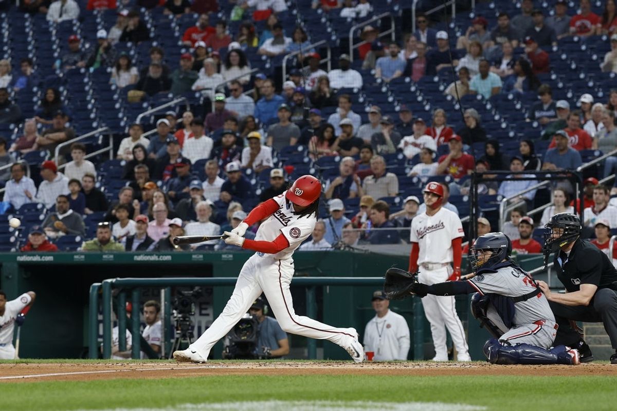 May 6, 2026; Washington, District of Columbia, USA; Washington Nationals shortstop CJ Abrams (5) hits an RBI double against the Minnesota Twins during the fourth inning at Nationals Park. Mandatory Credit: Geoff Burke-Imagn Images
