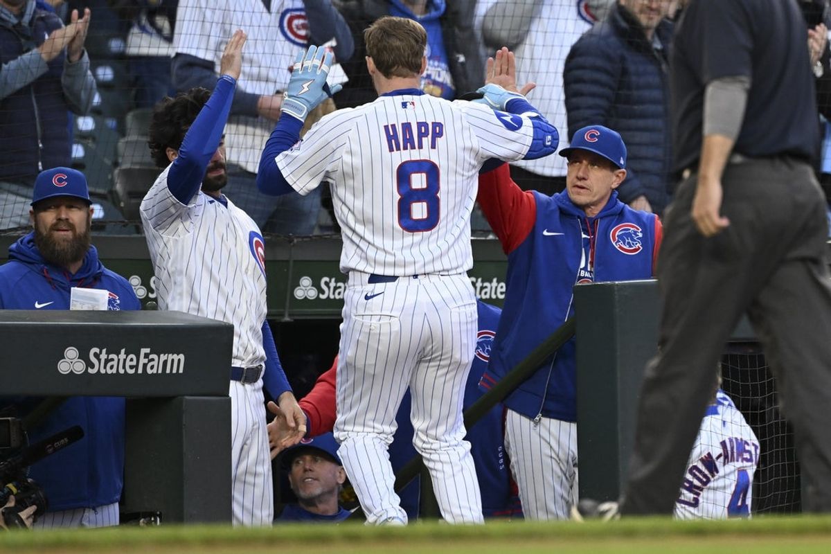 May 6, 2026; Chicago, Illinois, USA Chicago Cubs left fielder Ian Happ (8) Chicago Cubs manager Craig Counsell (11), right,  after he hits a  two run home run  during the first inning against the Cincinnati Reds at Wrigley Field. Mandatory Credit: Matt Marton-Imagn Images