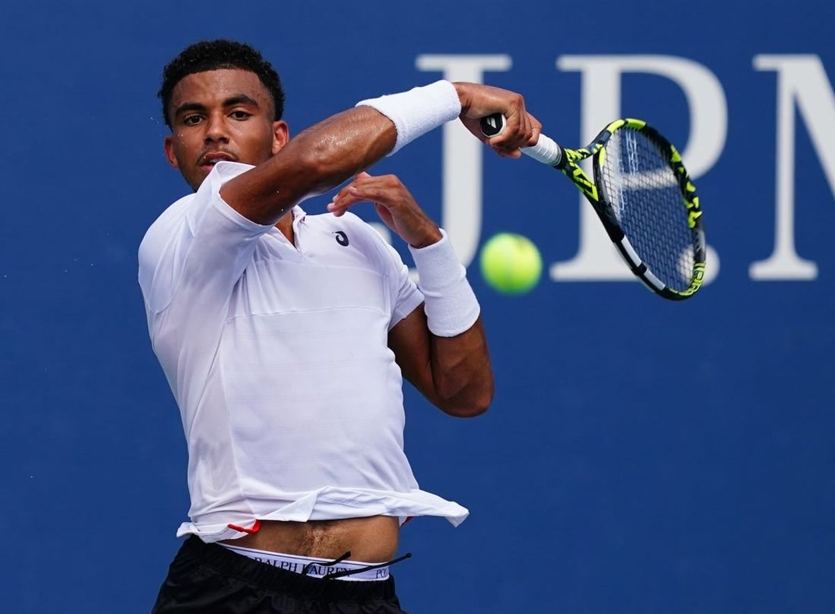 Aug 29, 2023; Flushing, NY, USA;  Arthur Fils of France hits a shot against Tallon Griekspoor of Netherlands on day two of the 2023 U.S. Open tennis tournament at the USTA Billie Jean King National Tennis Center.