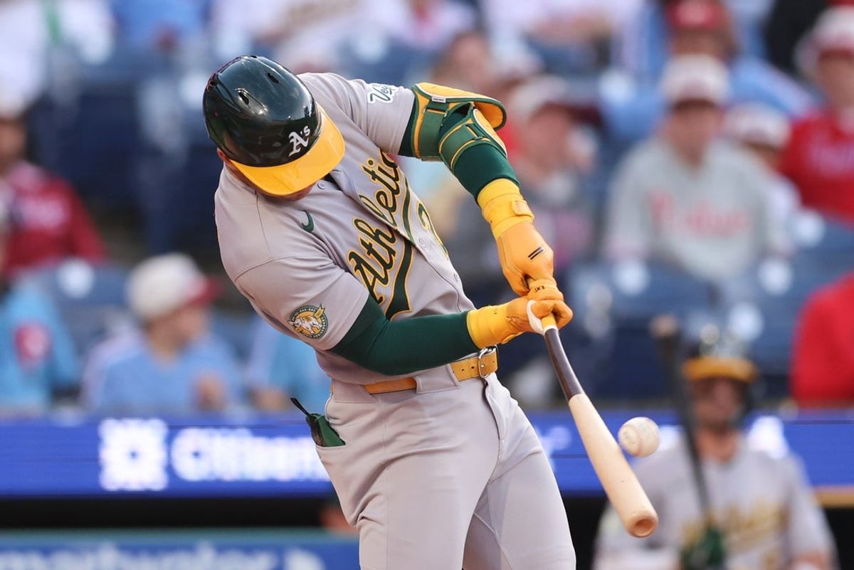 May 7, 2026; Philadelphia, Pennsylvania, USA; Athletics right fielder Brent Rooker (25) hits a two RBI home run against the Philadelphia Phillies during the first inning at Citizens Bank Park. Mandatory Credit: Bill Streicher-Imagn Images