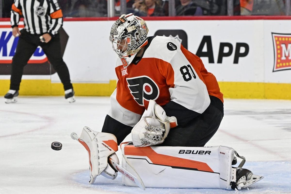 May 7, 2026; Philadelphia, Pennsylvania, USA; Philadelphia Flyers goaltender Dan Vladar (80) makes a save against the Carolina Hurricanes during the second period in game three of the second round of the 2026 Stanley Cup Playoffs at Xfinity Mobile Arena. Mandatory Credit: Eric Hartline-Imagn Images
