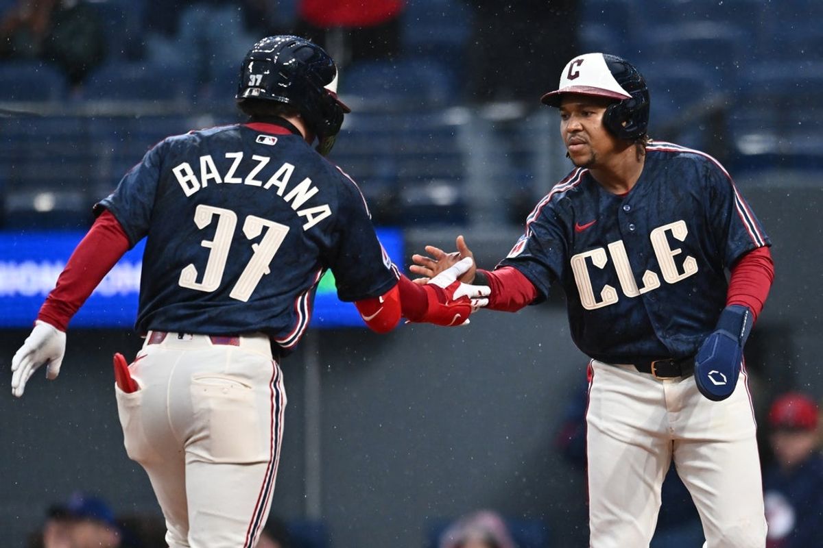 May 8, 2026; Cleveland, Ohio, USA; Cleveland Guardians second baseman Travis Bazzana (37) celebrates with third baseman Jose Ramirez (11) after hitting a home run during the first inning against the Minnesota Twins at Progressive Field. Mandatory Credit: Ken Blaze-Imagn Images