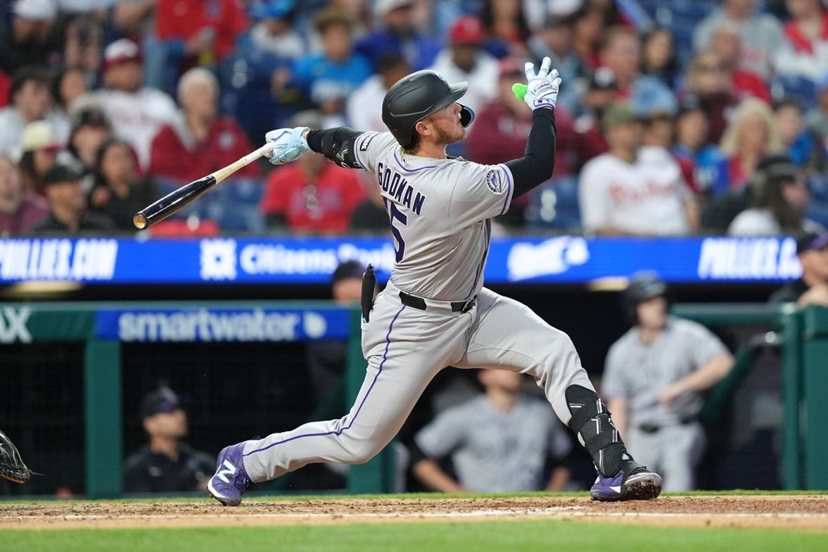 May 8, 2026; Philadelphia, Pennsylvania, USA; Colorado Rockies catcher Hunter Goodman (15) hits a two-run home run against the Philadelphia Phillies in the fourth inning at Citizens Bank Park. Mandatory Credit: Kyle Ross-Imagn Images