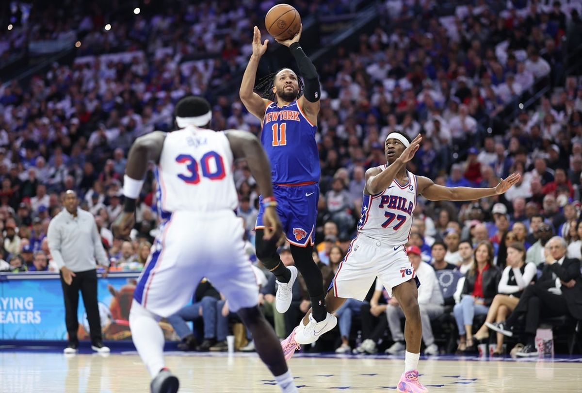 May 8, 2026; Philadelphia, Pennsylvania, USA; New York Knicks guard Jalen Brunson (11) shoots in front of Philadelphia 76ers guard Vj Edgecombe (77) during the second quarter of game three of the second round of the 2026 NBA Playoffs at Xfinity Mobile Arena. Mandatory Credit: Bill Streicher-Imagn Images