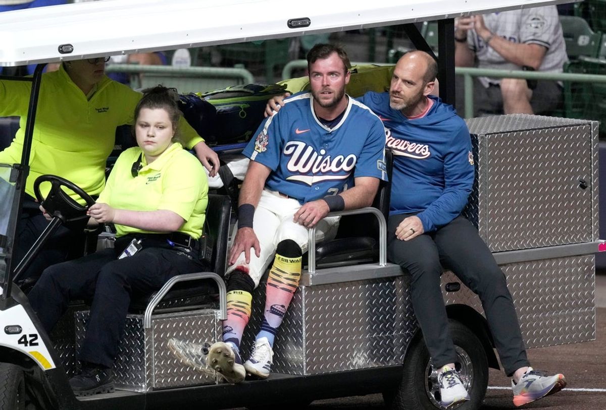 Milwaukee Brewers left fielder Brandon Lockridge (20) is carted off the field after being injured during the fourth inning of their game against the New York Yankees Friday, May 8, 2026 at American Family Field in Milwaukee, Wisconsin.