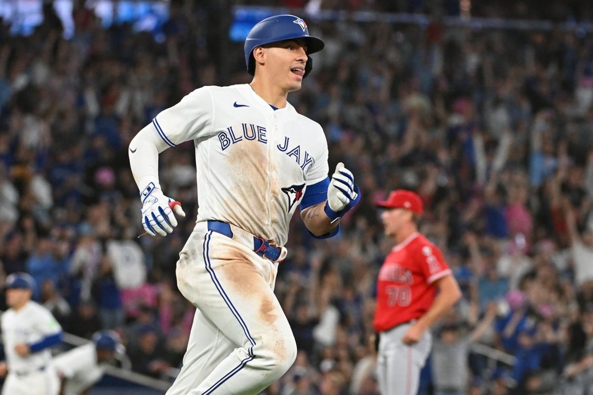 May 9, 2026; Toronto, Ontario, CAN; Toronto Blue Jays catcher Brandon Valenzuela (59) hits a three run home run i the fifth inning against the Los Angeles Angels at Rogers Centre. Mandatory Credit: Gerry Angus-Imagn Images