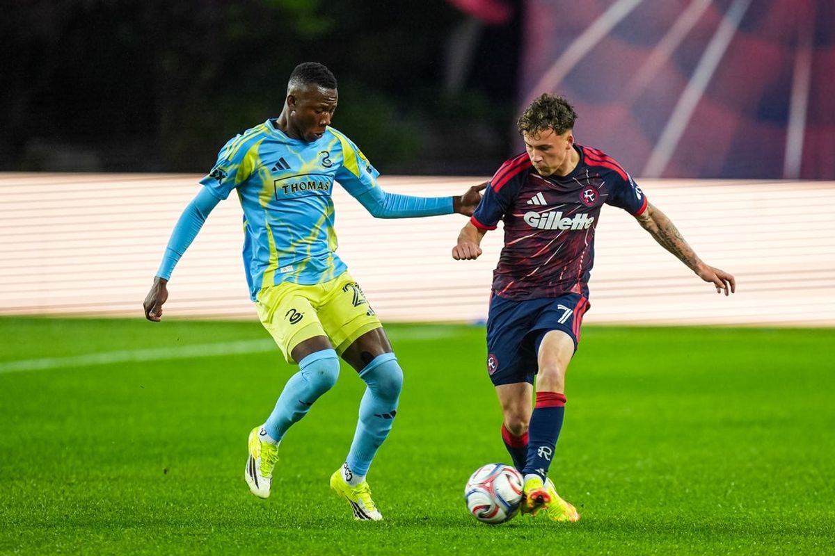 May 9, 2026; Foxborough, Massachusetts, USA; Philadelphia Union midfielder Danley Jean Jacques (21) works for the ball against New England Revolution forward Griffin Yow (7) in the first half at Gillette Stadium. Mandatory Credit: David Butler II-Imagn Images