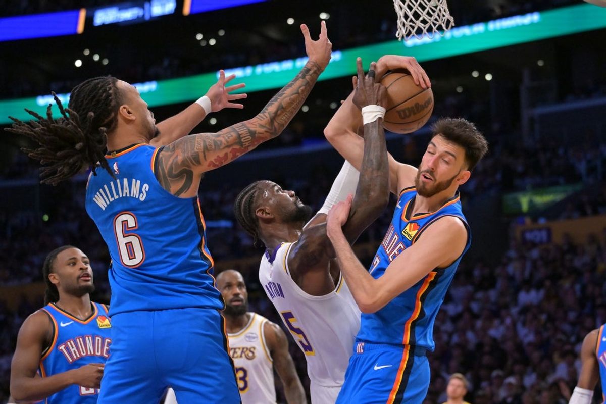 May 9, 2026; Los Angeles, California, USA; Oklahoma City Thunder forward Jaylin Williams (6) and center Chet Holmgren (7) fight for a rebound with Los Angeles Lakers center Deandre Ayton (5) during the first quarter of game three of the second round of the 2026 NBA Playoffs at Crypto.com Arena. Mandatory Credit: Jayne Kamin-Oncea-Imagn Images