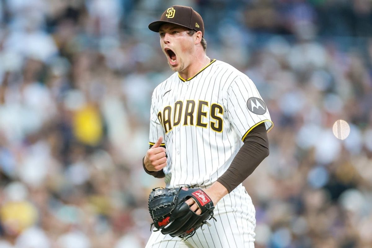 May 9, 2026; San Diego, California, USA; San Diego Padres relief pitcher Mason Miller (22) celebrates after defeating the St. Louis Cardinals at Petco Park. Mandatory Credit: David Frerker-Imagn Images