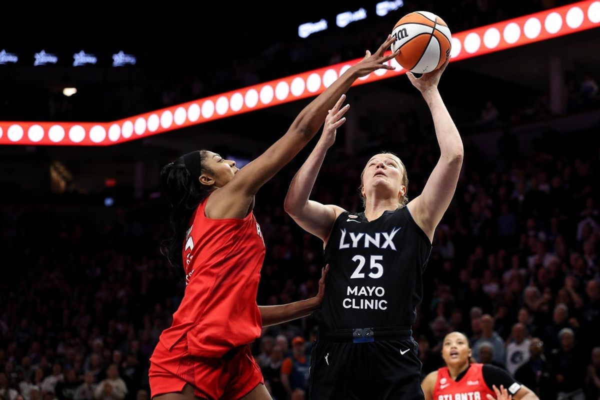 May 9, 2026; Minneapolis, Minnesota, USA; Atlanta Dream forward Angel Reese (5) blocks a shot by Minnesota Lynx center Emese Hof (25) during the second half at Target Center. Mandatory Credit: Matt Krohn-Imagn Images
