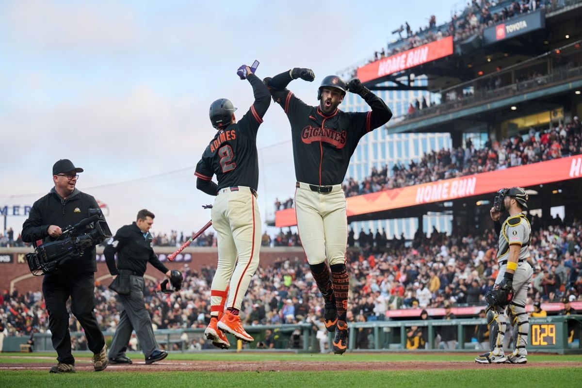 May 9, 2026; San Francisco, California, USA; San Francisco Giants infielder Bryce Eldridge (8) celebrates with infielder Willy Adames (2) after hitting a one run home run against the Pittsburgh Pirates during the fifth inning at Oracle Park. Mandatory Credit: Robert Edwards-Imagn Images