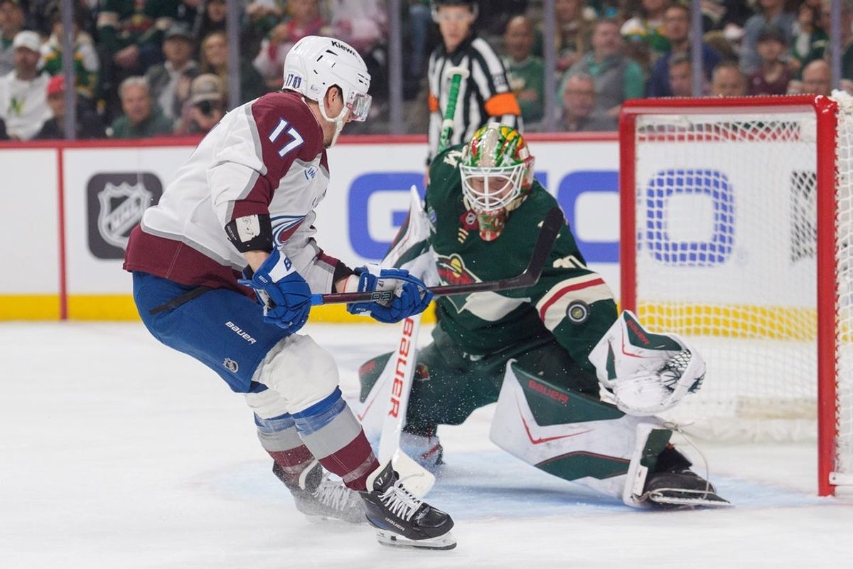 May 9, 2026; Saint Paul, Minnesota, USA; Colorado Avalanche center Parker Kelly (17) on a breakaway against Minnesota Wild goaltender Jesper Wallstedt (30) in the first period of game three of the second round of the 2026 Stanley Cup Playoffs at Grand Casino Arena. Mandatory Credit: Matt Blewett-Imagn Images