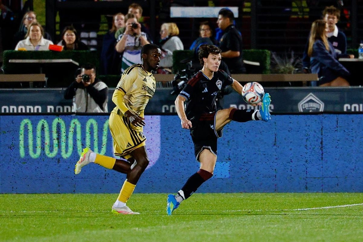 May 9, 2026; Commerce City, Colorado, USA; Colorado Rapids midfielder Paxten Aaronson (10) fields the ball ahead of St. Louis City defender Fallou Fall (27) in the second half at Dick's Sporting Goods Park. Mandatory Credit: Isaiah J. Downing-Imagn Images