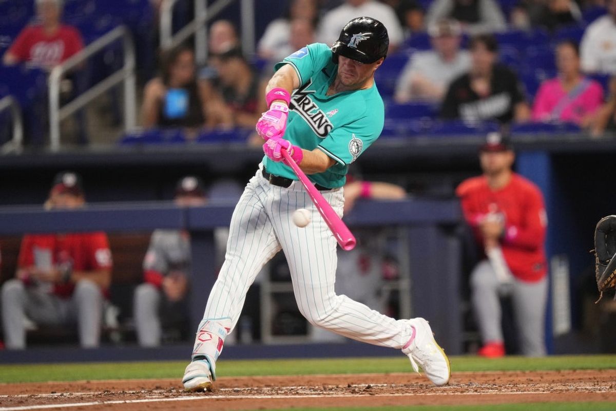 May 10, 2026; Miami, Florida, USA;  Miami Marlins center fielder Jakob Marsee (87) hits a single in the first inning against the Washington Nationals at loanDepot Park. Mandatory Credit: Jim Rassol-Imagn Images