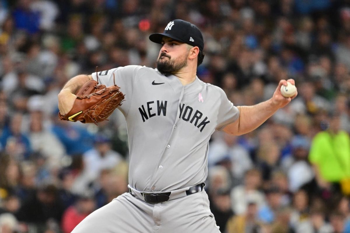 May 10, 2026; Milwaukee, Wisconsin, USA; New York Yankees starting pitcher Carlos Rodon (55) throws a pitch in the first inning against the Milwaukee Brewers at American Family Field. Mandatory Credit: Benny Sieu-Imagn Images