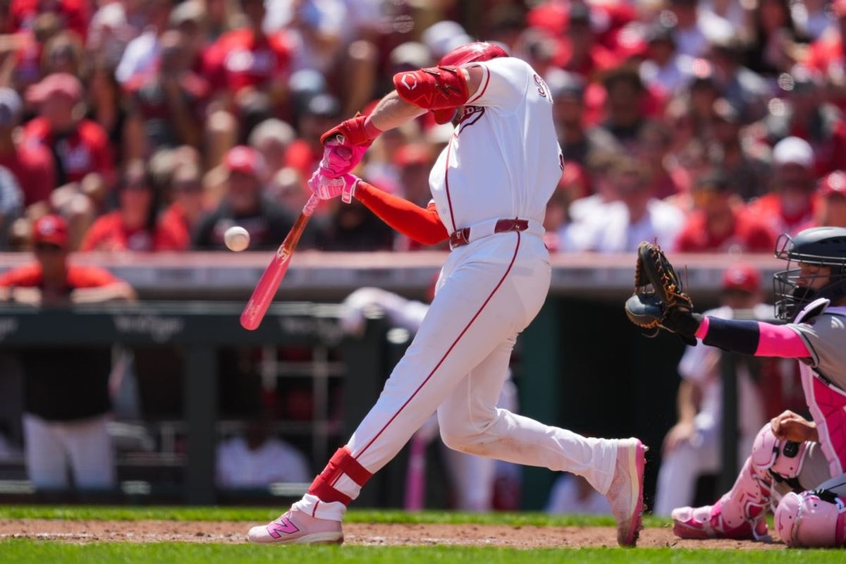 May 10, 2026; Cincinnati, Ohio, USA;  Cincinnati Reds catcher Tyler Stephenson (37) hits an RBI single against the Houston Astros in the fourth inning at Great American Ball Park. Mandatory Credit: Aaron Doster-Imagn Images