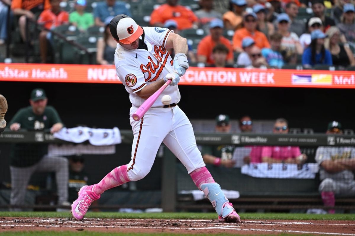 May 10, 2026; Baltimore, Maryland, USA; Baltimore Orioles first baseman Pete Alonso (25) hits the ball into play against the Athletics during the second inning at Oriole Park at Camden Yards. Mandatory Credit: Rafael Suanes-Imagn Images