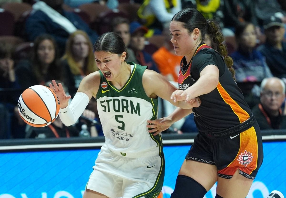 May 10, 2026; Uncasville, Connecticut, USA; Seattle Storm guard Jade Melbourne (5) drives the ball against Connecticut Sun guard Charlisse Leger-Walker (4) in the second half at Mohegan Sun Arena. Mandatory Credit: David Butler II-Imagn Images
