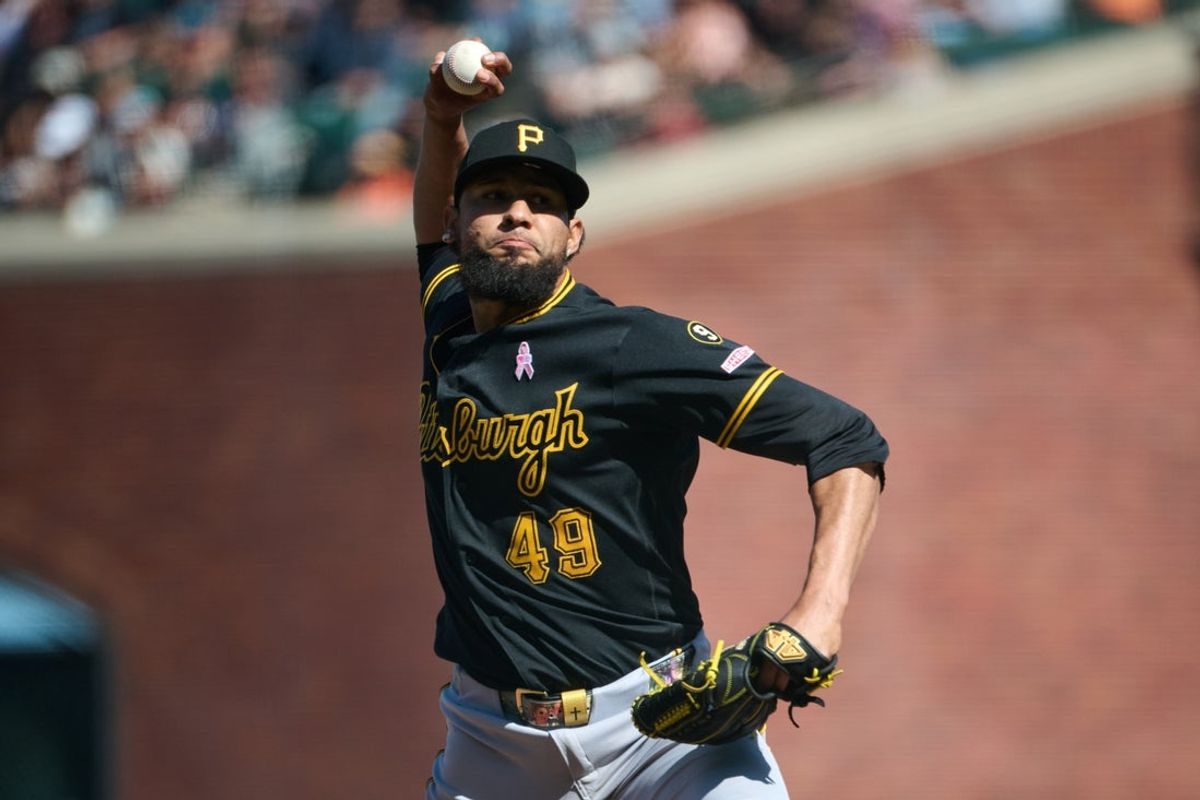 May 10, 2026; San Francisco, California, USA; Pittsburgh Pirates pitcher Yohan Ramirez (49) throws a pitch against the San Francisco Giants during the tenth inning at Oracle Park. Mandatory Credit: Robert Edwards-Imagn Images