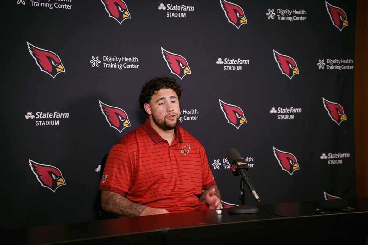 Cardinals rookie lineman from Texas A&M, Chase Bisontis, speaks to the media at the Arizona Cardinals training center on May 11, 2026, in Tempe.