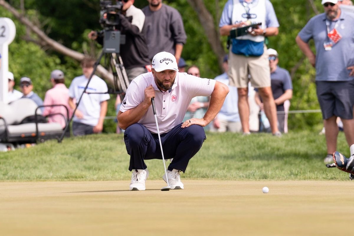 May 9, 2026; Sterling, Virginia, USA; Jon Rahm lines up a putt during the third round of LIV Golf Virginia golf tournament at Trump National Golf Club. Mandatory Credit: John (Jack) Power-Imagn Images