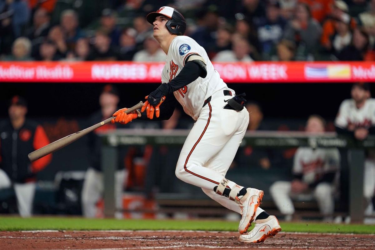 May 11, 2026; Baltimore, Maryland, USA; Baltimore Orioles designated hitter Coby Mayo (16) connects on a three-run home run during the seventh inning against the New York Yankees at Oriole Park at Camden Yards. Mandatory Credit: Mitch Stringer-Imagn Images