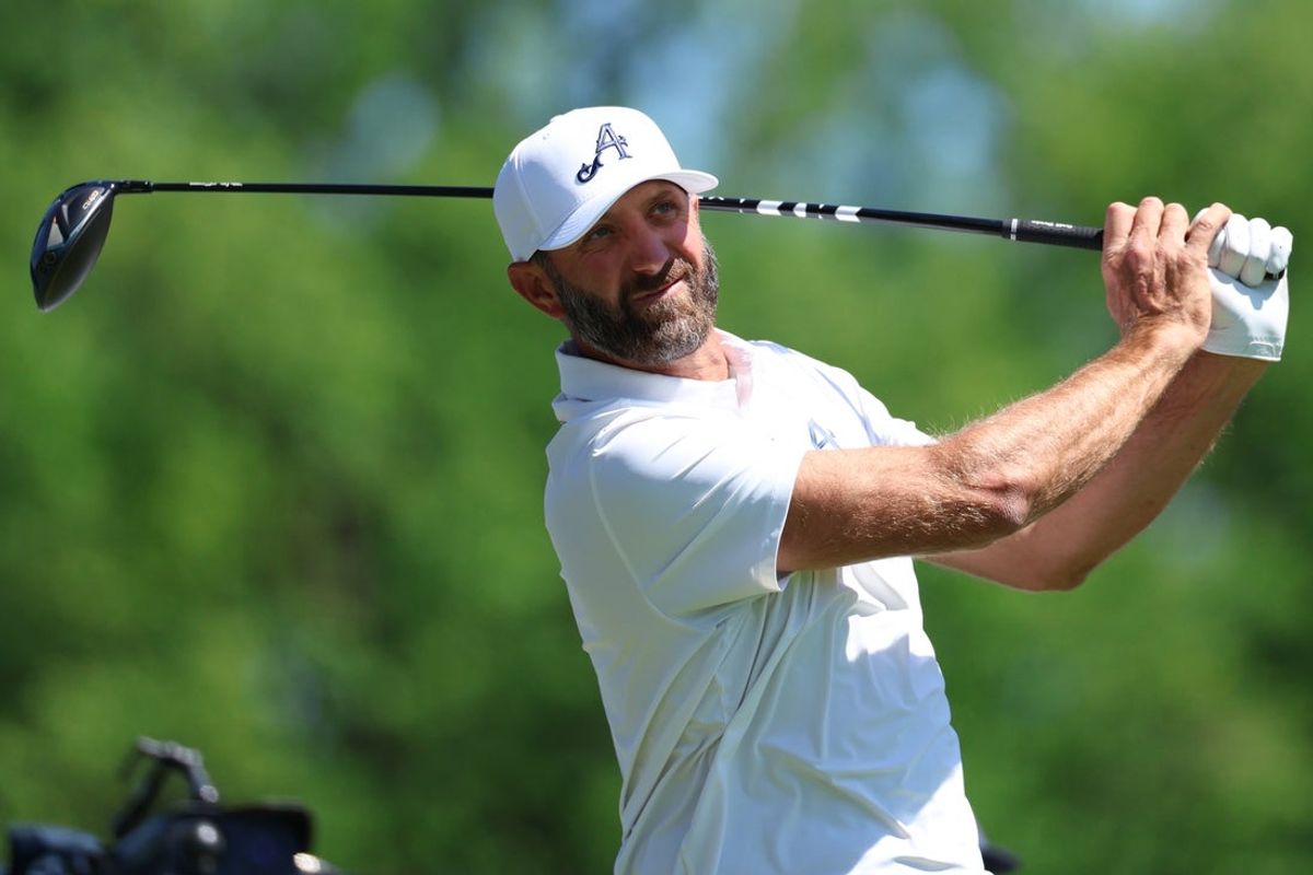 May 12, 2026; Newtown Square, Pennsylvania, USA; Dustin Johnson plays a tee shot on hole 2 during a practice round of the PGA Championship golf tournament at Aronimink Golf Club. Mandatory Credit: Bill Streicher-Imagn Images