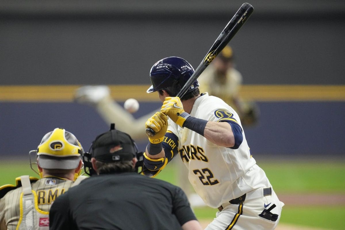 May 12, 2026; Milwaukee, Wisconsin, USA; Milwaukee Brewers outfielder Christian Yelich (22) up to bat after coming off the injured list against the San Diego Padres in the firs tinning at American Family Field. Mandatory Credit: Michael McLoone-Imagn Images