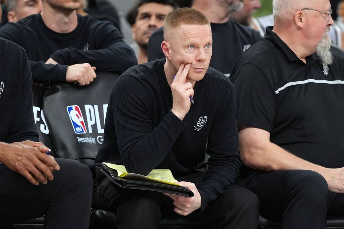 May 12, 2026; San Antonio, Texas, USA; San Antonio Spurs assistant head coach Sean Sweeney observes the second half of play during game five of the second round of the 2026 NBA Playoffs against the Minnesota Timberwolves at Frost Bank Center. Mandatory Credit: Scott Wachter-Imagn Images