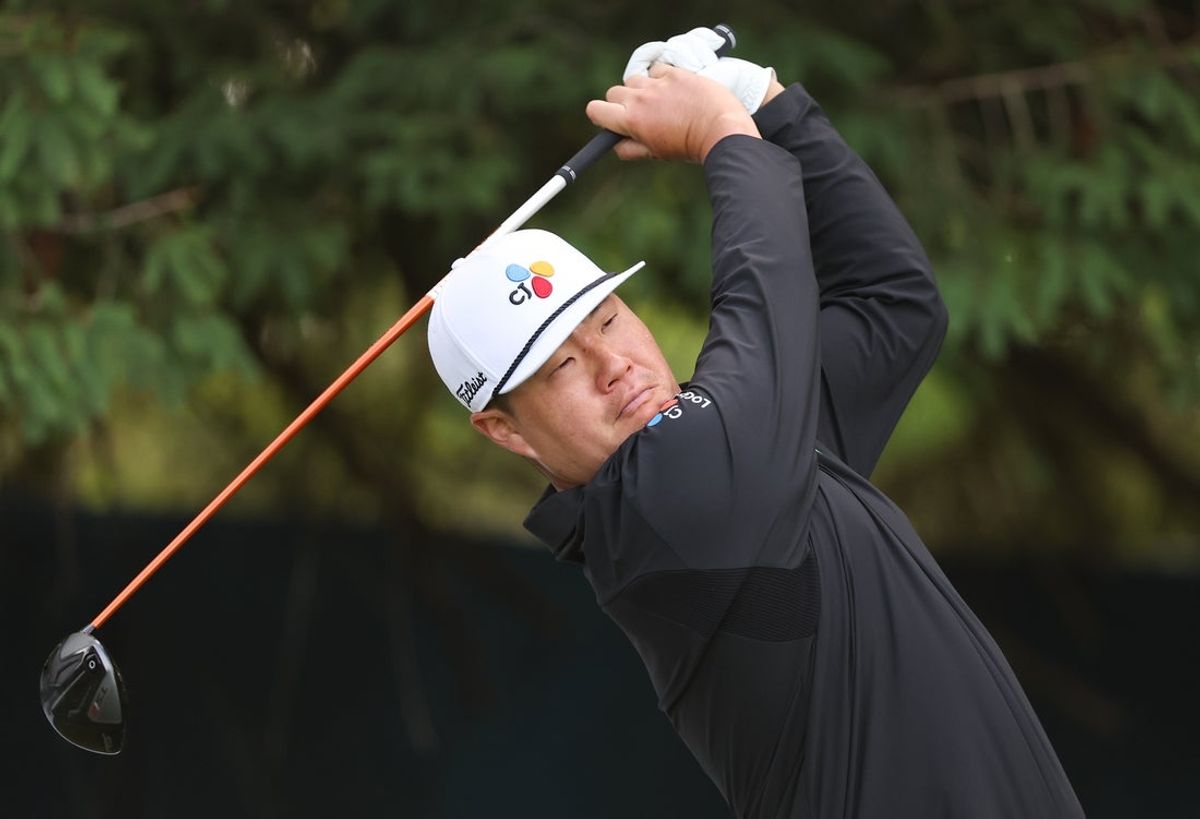 May 13, 2026; Newtown Square, Pennsylvania, USA; Sungjae Im plays a tee shot on the fourth hole during a practice round of the PGA Championship golf tournament at Aronimink Golf Club. Mandatory Credit: Bill Streicher-Imagn Images