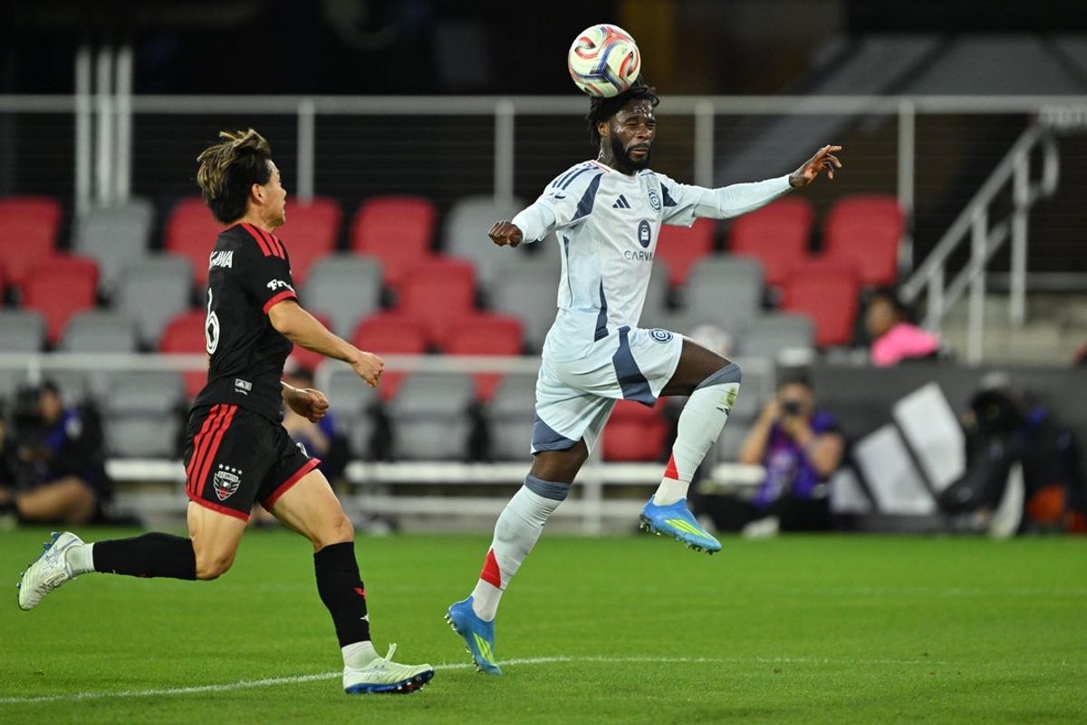 May 13, 2026; Washington, District of Columbia, USA;  Chicago Fire forward Jonathan Bamba (19) attempts to head the ball to the net in the first half against DC United at Audi Field. Mandatory Credit: Jamie Sabau-Imagn Images
