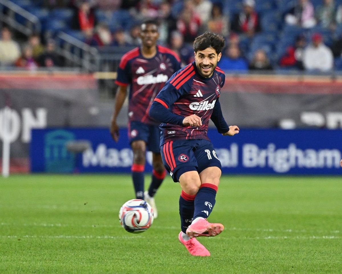 May 13, 2026; Foxborough, Massachusetts, USA; New England Revolution midfielder Carles Gil (10) passes the ball against the Nashville SC during the first half at Gillette Stadium. Mandatory Credit: Eric Canha-Imagn Images