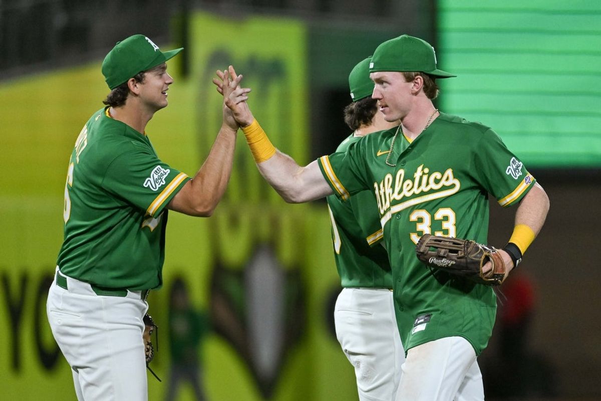 May 13, 2026; West Sacramento, California, USA; Athletics center fielder Henry Bolte (33) celebrates with first baseman Nick Kurtz (16) after defeating the St. Louis Cardinals at Sutter Health Park. Mandatory Credit: Ed Szczepanski-Imagn Images