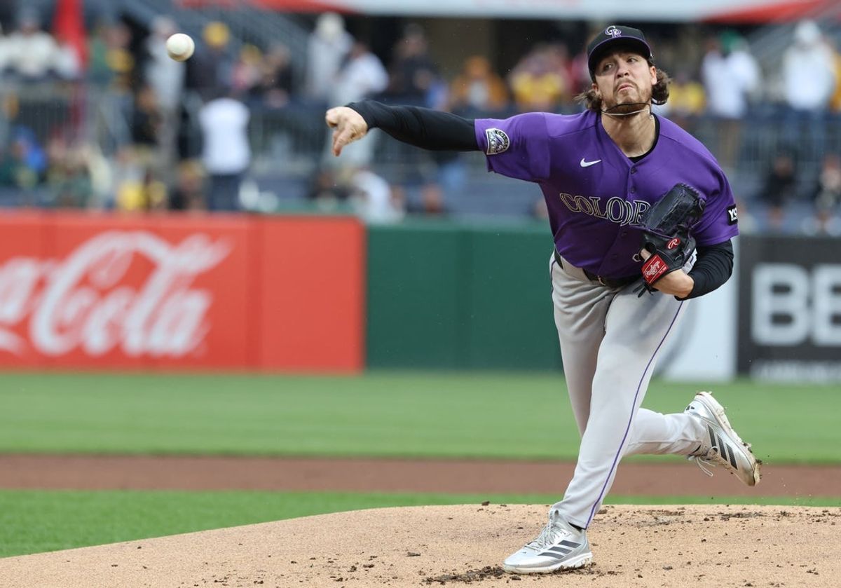 May 14, 2026; Pittsburgh, Pennsylvania, USA;  Colorado Rockies starting pitcher Chase Dollander (32) delivers a pitch against the Pittsburgh Pirates during the first inning at PNC Park. Mandatory Credit: Charles LeClaire-Imagn Images