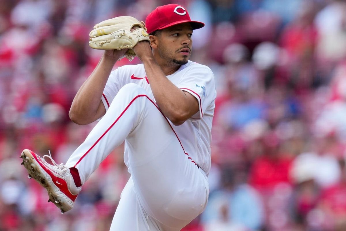 Cincinnati Reds pitcher Chase Burns (26) delivers a pitch in the first inning of the MLB National League game between the Cincinnati Reds and the Washington Nationals at Great American Ball Park in downtown Cincinnati on Thursday, May 14, 2026. The Reds led 2-0 after three innings.