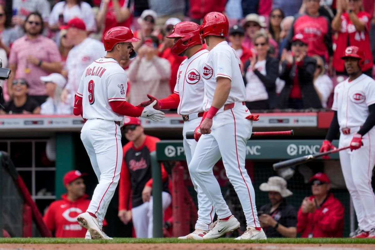 Cincinnati Reds second baseman Matt McLain (9) celebrates a two-run home run in the first inning of the MLB National League game between the Cincinnati Reds and the Washington Nationals at Great American Ball Park in downtown Cincinnati on Thursday, May 14, 2026. The Reds led 2-0 after three innings.