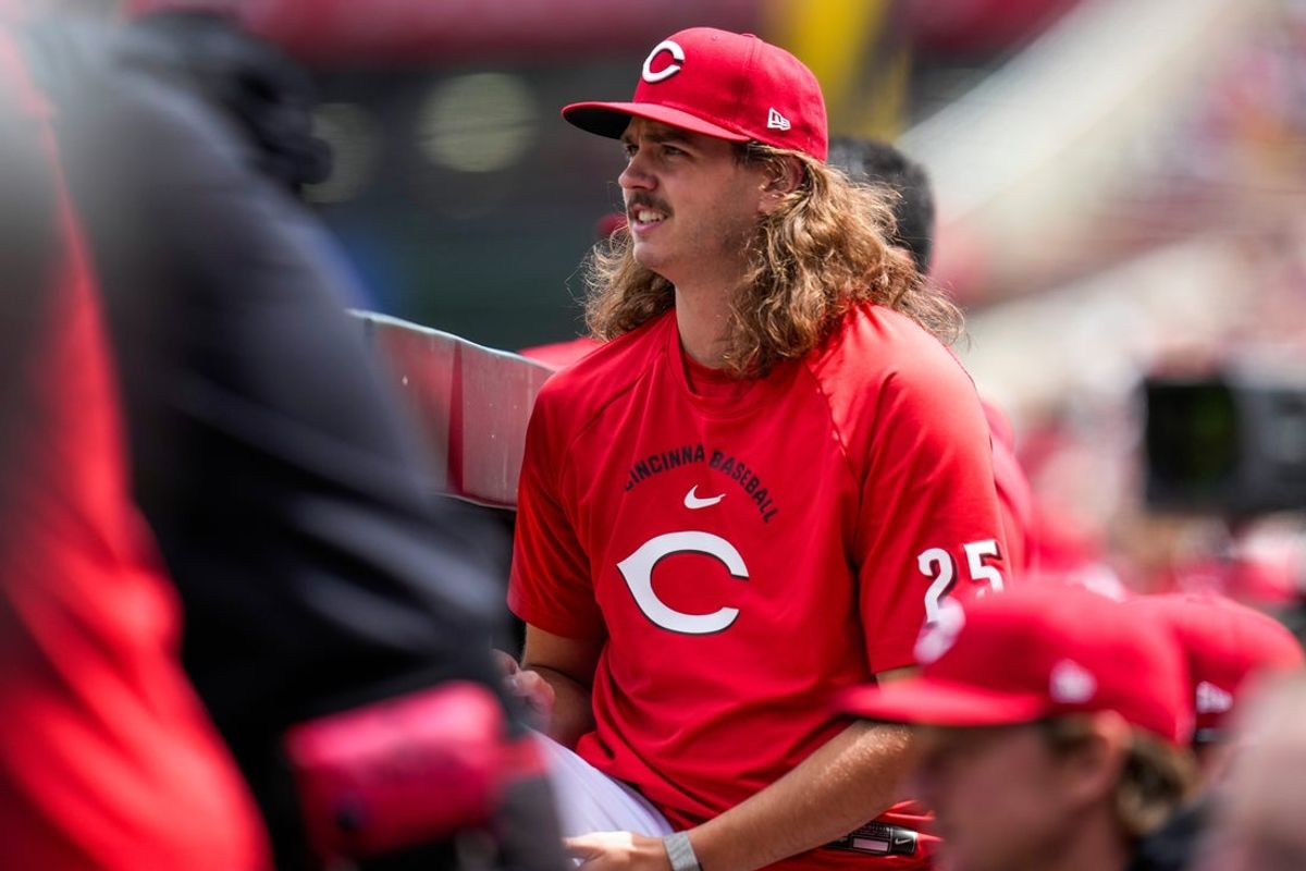 Injured Cincinnati Reds pitcher Rhett Lowder (25) watches from the dugout in the eighth inning of the MLB National League game between the Cincinnati Reds and the Washington Nationals at Great American Ball Park in downtown Cincinnati on Thursday, May 14, 2026. The Reds led 2-0 after three innings. The Reds won 15-1.