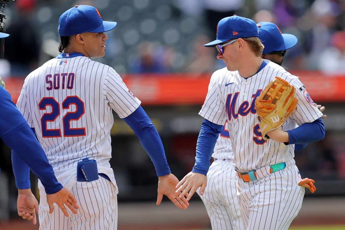 May 14, 2026; New York City, New York, USA; New York Mets designated hitter Juan Soto (22) and center fielder A.J. Ewing (9) celebrate after defeating the Detroit Tigers at Citi Field. Mandatory Credit: Brad Penner-Imagn Images