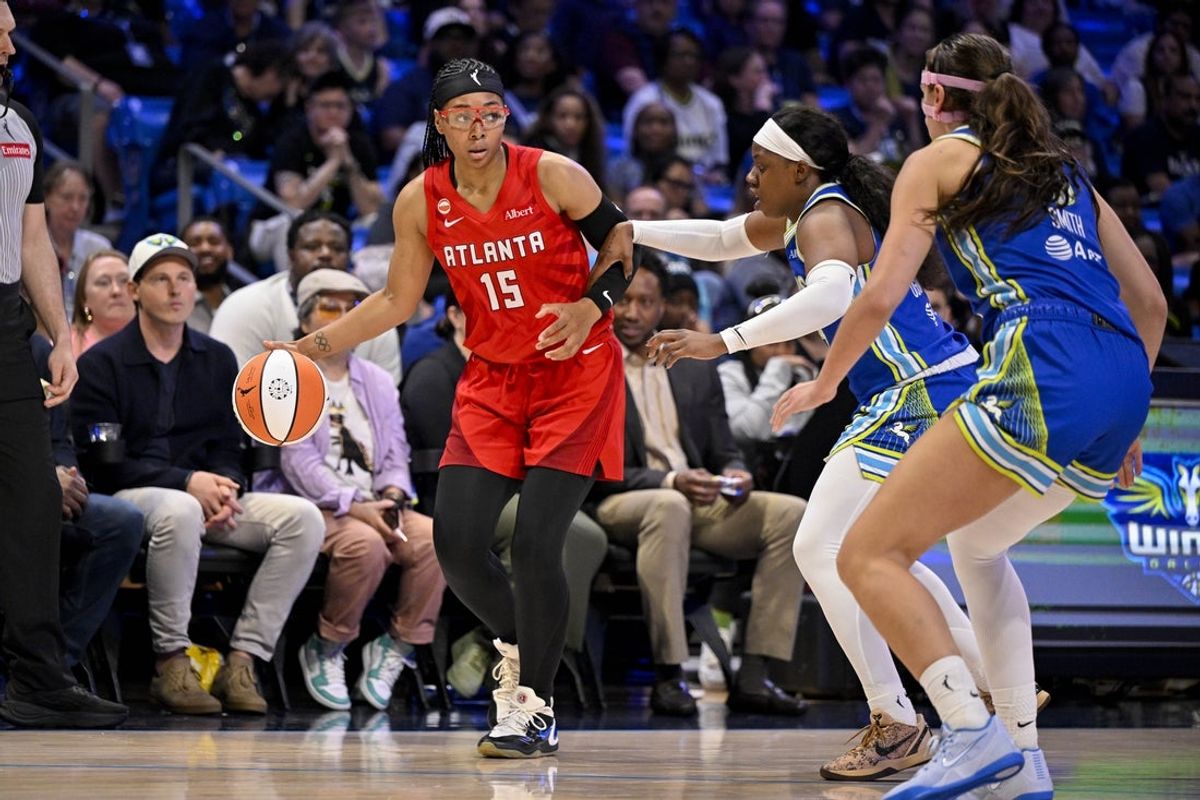 May 12, 2026; Arlington, Texas, USA; Atlanta Dream guard Allisha Gray (15) controls the ball in front of Dallas Wings guard Arike Ogunbowale (24) during the game between the Wings and the Dream at College Park Center. Mandatory Credit: Jerome Miron-Imagn Images