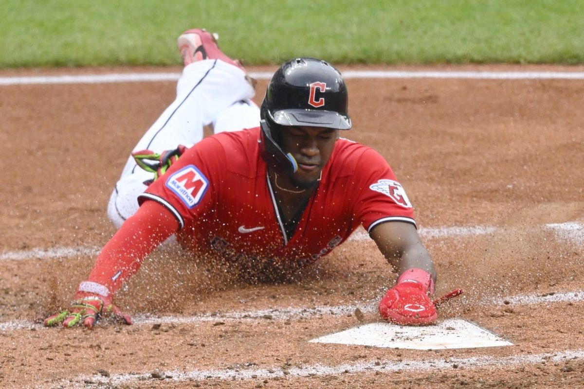 May 16, 2026; Cleveland, Ohio, USA; Cleveland Guardians right fielder Angel Martinez (1) scores in the second inning against the Cincinnati Reds at Progressive Field. Mandatory Credit: David Richard-Imagn Images