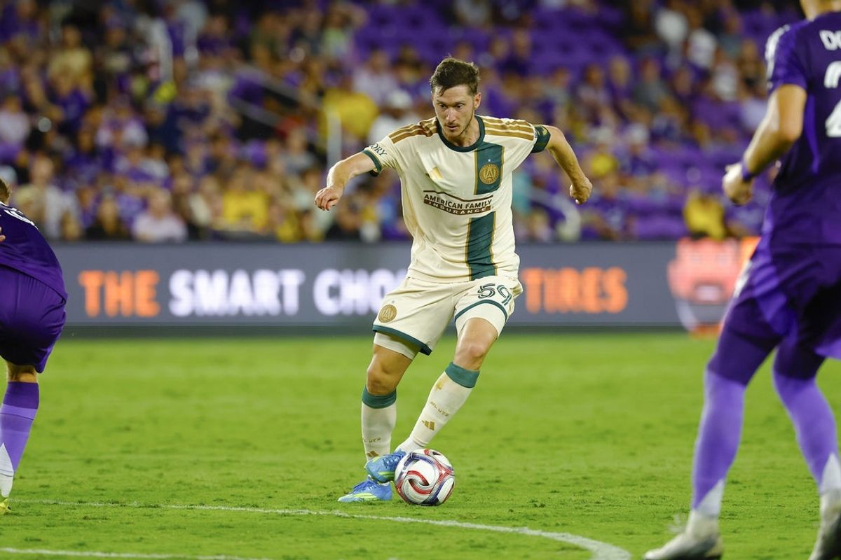 May 16, 2026; Orlando, Florida, USA;  Atlanta United FC midfielder Aleksei Miranchuk (59) tries to work through defenders in the second half against the Orlando City SC at Inter&Co Stadium. Mandatory Credit: Russell Lansford-Imagn Images